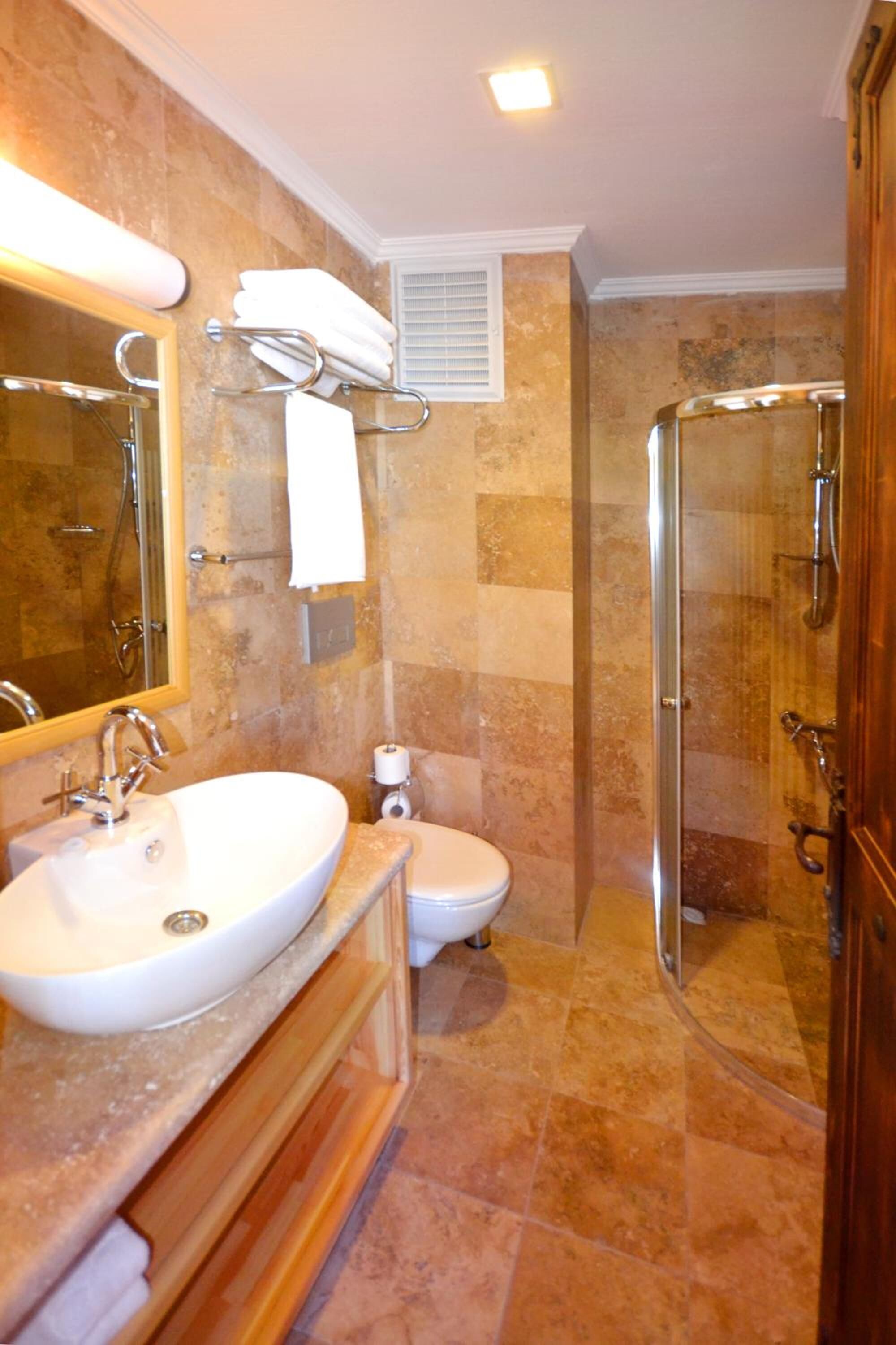 duplex | bathroom | shower, free toiletries, hair dryer, slippers