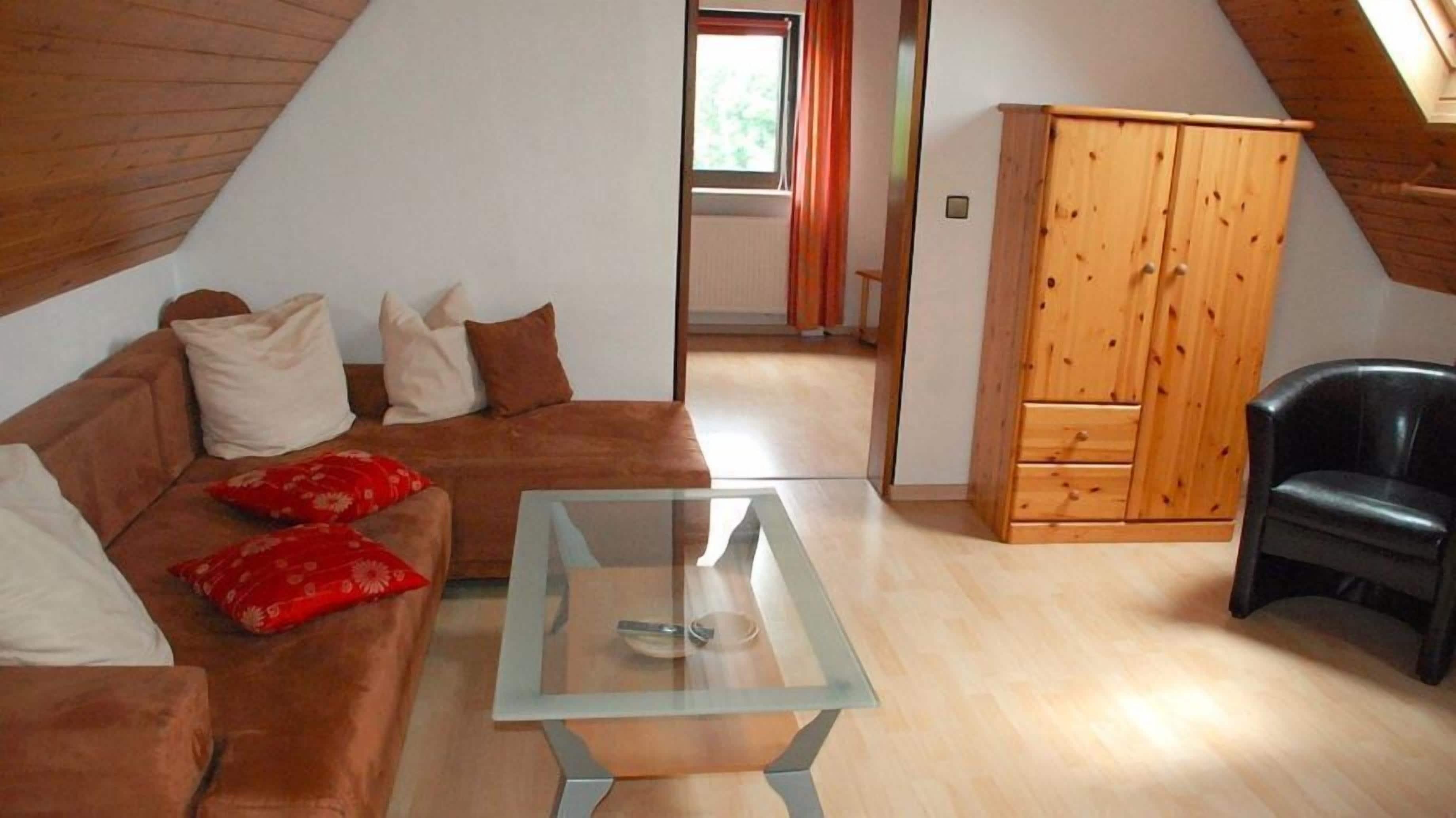 Standard Double Room | Living area | Flat-screen TV