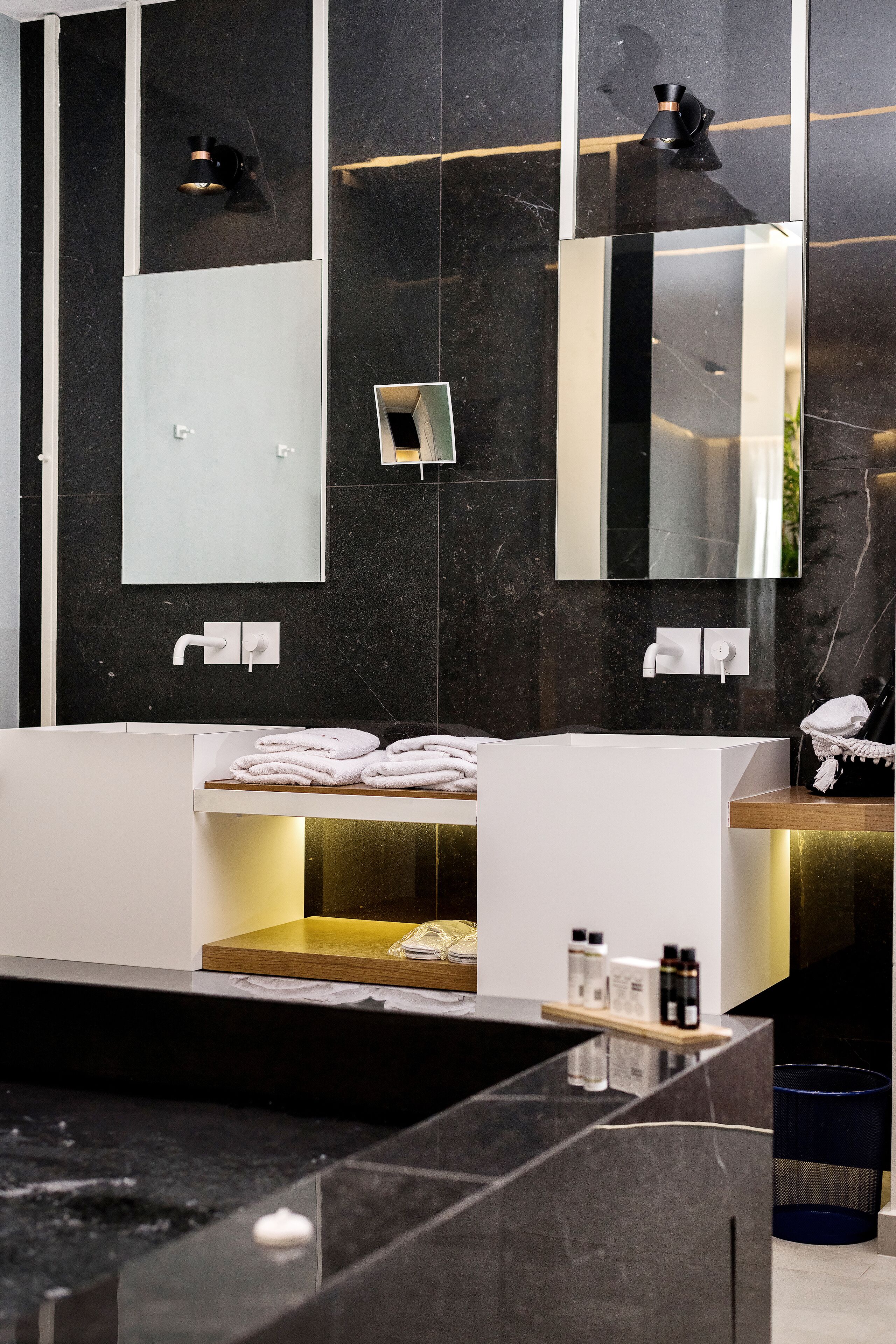 separate bathtub and shower, rainfall showerhead, designer toiletries