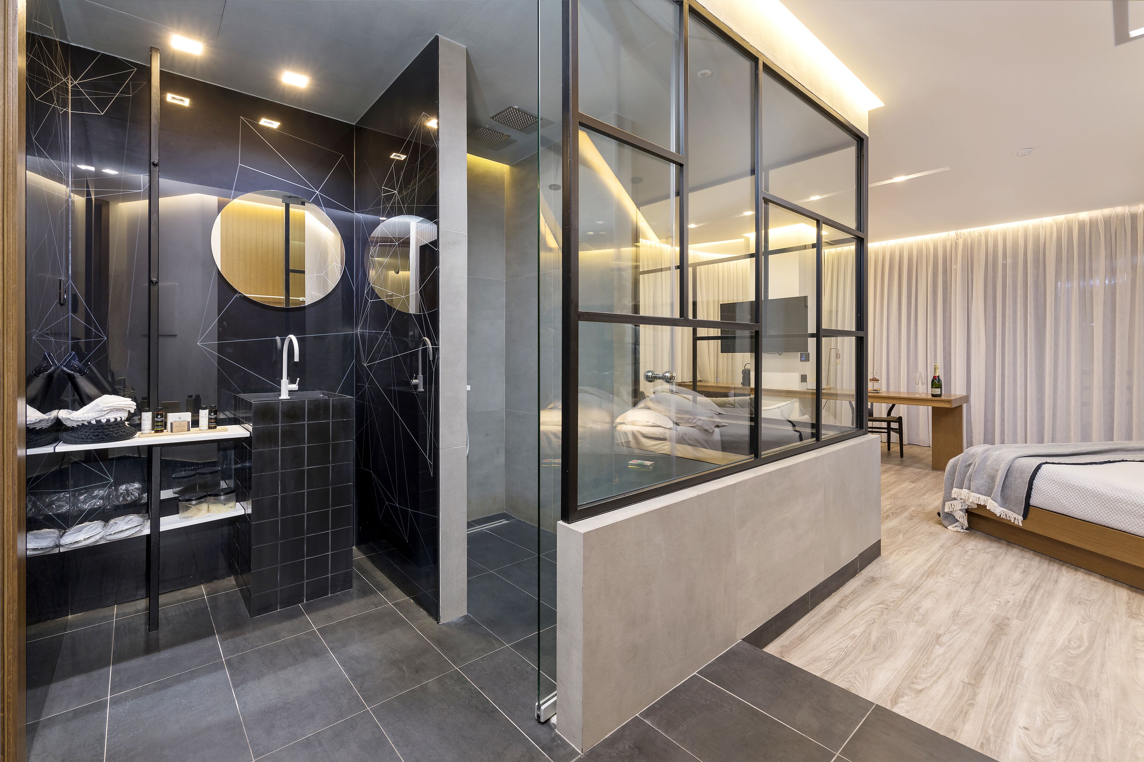 separate bathtub and shower, rainfall showerhead, designer toiletries