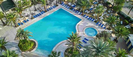 Indoor pool, outdoor pool, pool umbrellas