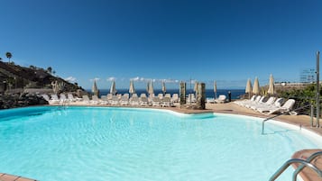 Outdoor pool, open 10:30 AM to 8:30 PM, pool loungers