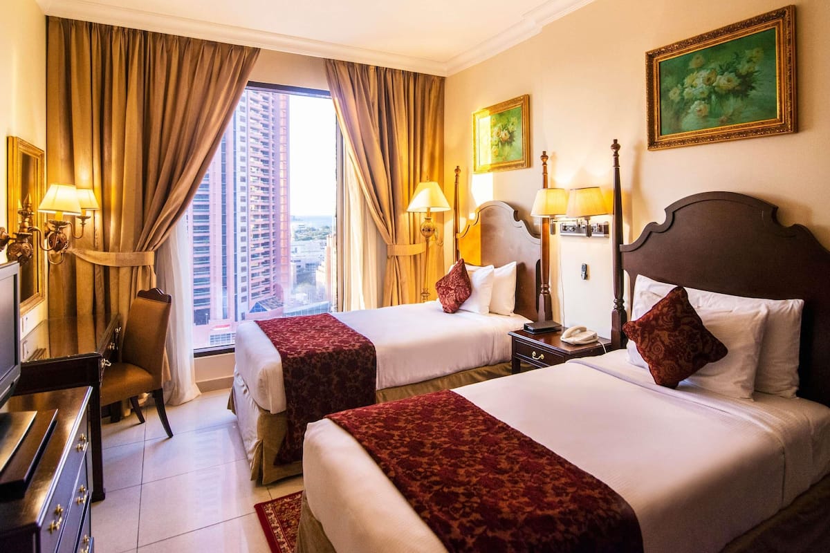One-Bedroom Apartment City View Twin Bed next to Metro Station | 1 bedroom, minibar, in-room safe, desk