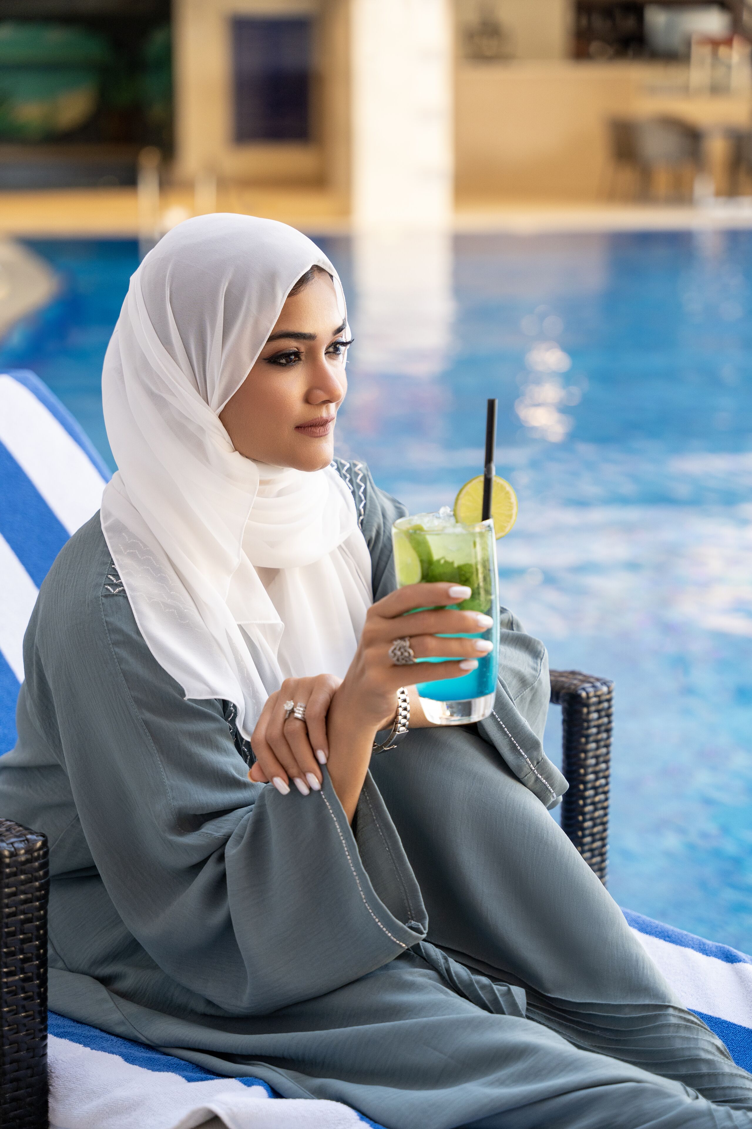 outdoor pool, open 7:00 am to 7:00 pm, pool loungers, lifeguards on site