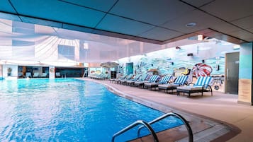 Outdoor pool, open 7:00 AM to 7:00 PM, pool loungers, lifeguards on site