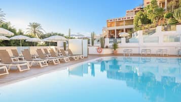 Outdoor pool, pool umbrellas, pool loungers