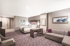 Deluxe Suite, 1 King Bed, Non Smoking | Premium bedding, in-room safe, desk, iron/ironing board