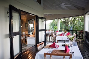 Breakfast, lunch, dinner served; Fusion cuisine, garden views