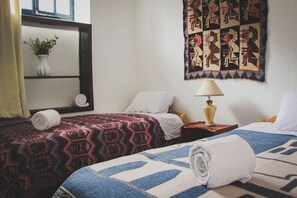 Economy Twin Room, 2 Single Beds, Shared Bathroom, Ground Floor | Cots/infant beds, rollaway beds, free WiFi