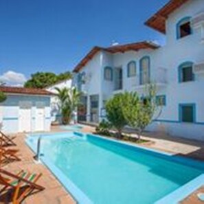 Outdoor pool, pool umbrellas, pool loungers