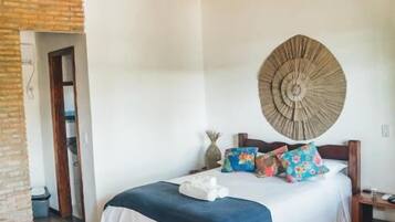 Quarto quádruplo superior (Superior Quadruple Room) | Frigobar, individualmente decorados, individualmente mobiliados