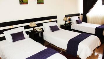 Habitación triple | Caja de seguridad en la habitación, escritorio y wifi gratis