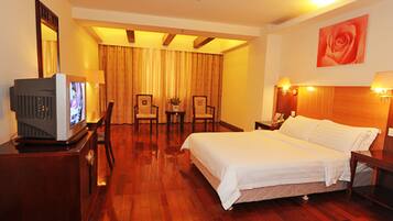 Minibar, desk, blackout drapes, iron/ironing board