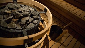 Suite, Sauna | Bathroom | Free toiletries, hair dryer, towels