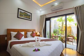 Luxury Double Room, Garden View | Individually furnished, desk, laptop workspace, blackout drapes - Hoi An SunLake Villa (Da Nang)