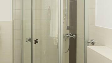 Shower, free toiletries, hair dryer, towels