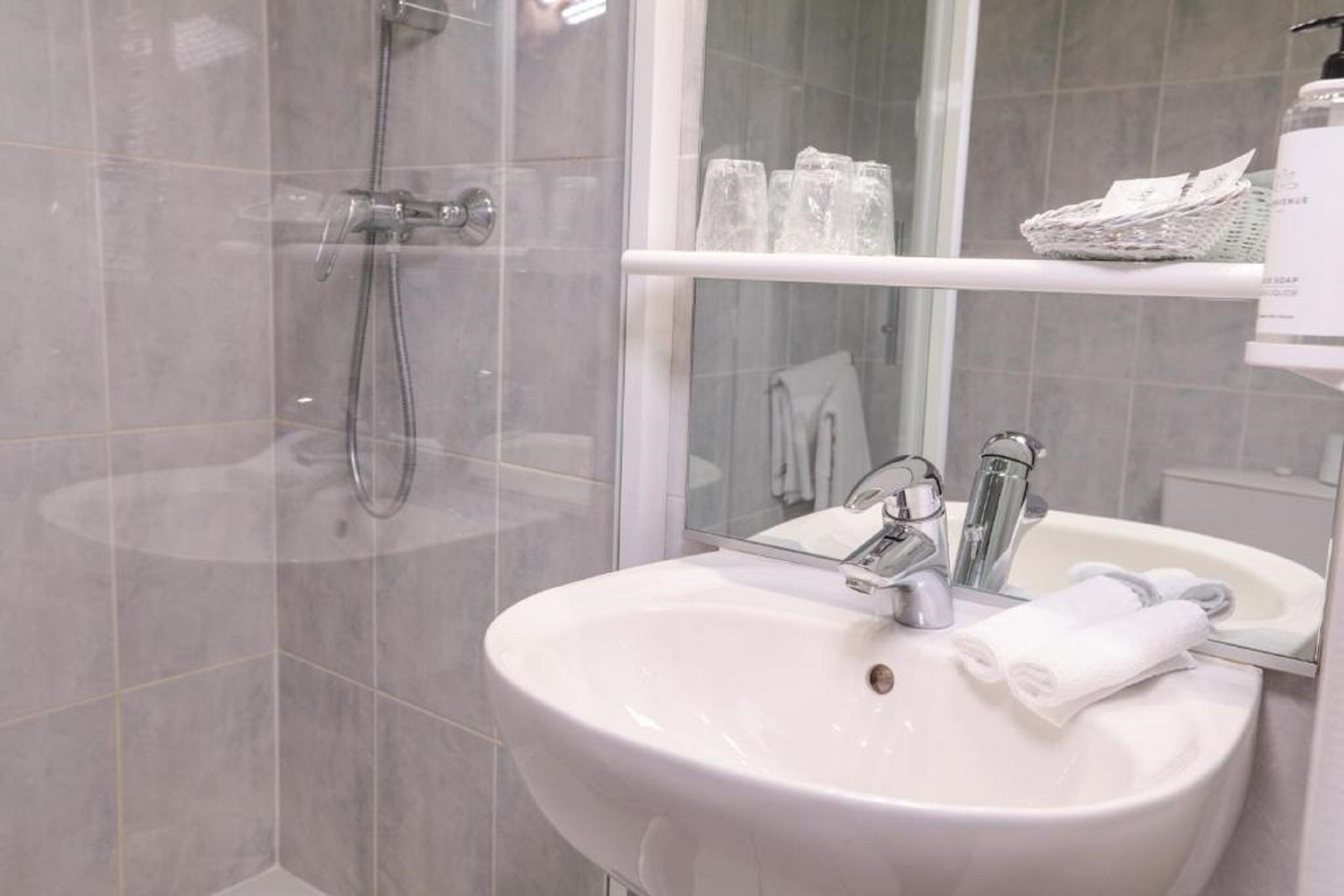 comfort room | bathroom | free toiletries, hair dryer, bathrobes, towels