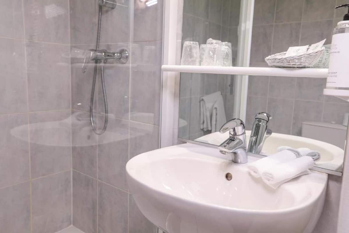 comfort room | bathroom | free toiletries, hair dryer, bathrobes, towels