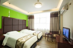 Minibar, desk, blackout curtains, iron/ironing board