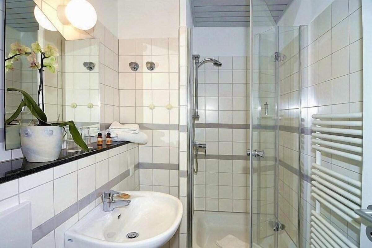 Bathroom | Shower, free toiletries, hair dryer, towels