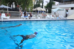 Outdoor pool, pool umbrellas, pool loungers