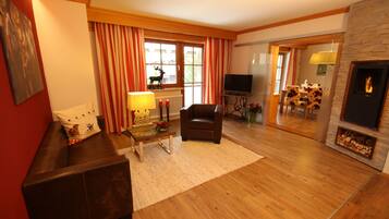 Comfort Condo, 2 Bedrooms, Balcony, Mountain View (103 | alpGENUSS) | Living room | Flat-screen TV