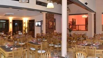 Breakfast, lunch, dinner served; local cuisine