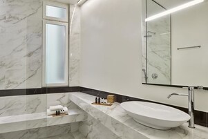 Shower, eco-friendly toiletries, hair dryer, slippers