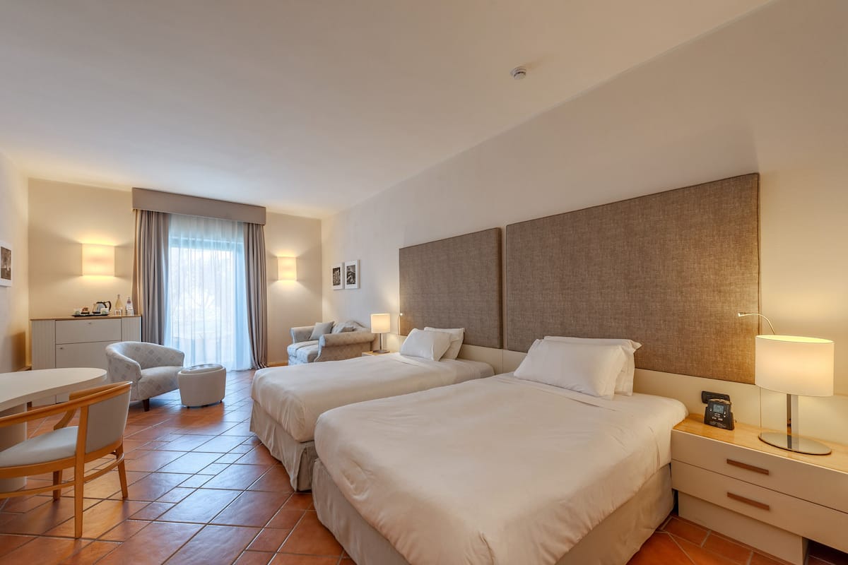 superior room (queen) | minibar, in-room safe, desk, laptop workspace