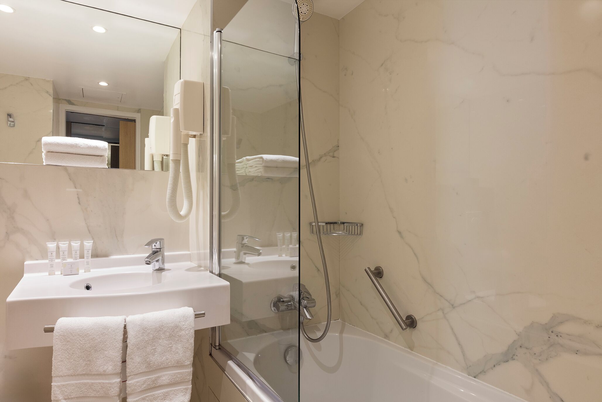 free toiletries, hair dryer, towels, soap