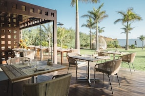 Lunch, dinner served; local and international cuisine, ocean views