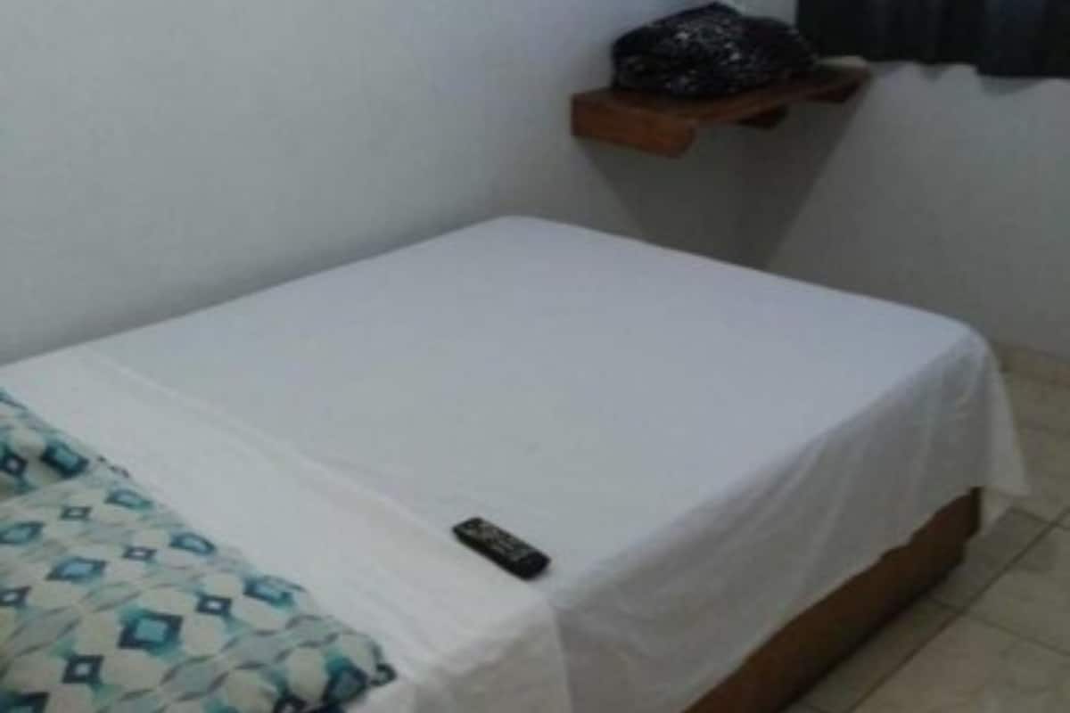 Cortinas blackout, Wi-Fi de cortesia, roupa de cama
