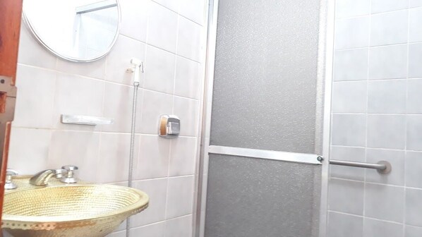 Shower, rainfall showerhead, designer toiletries, towels