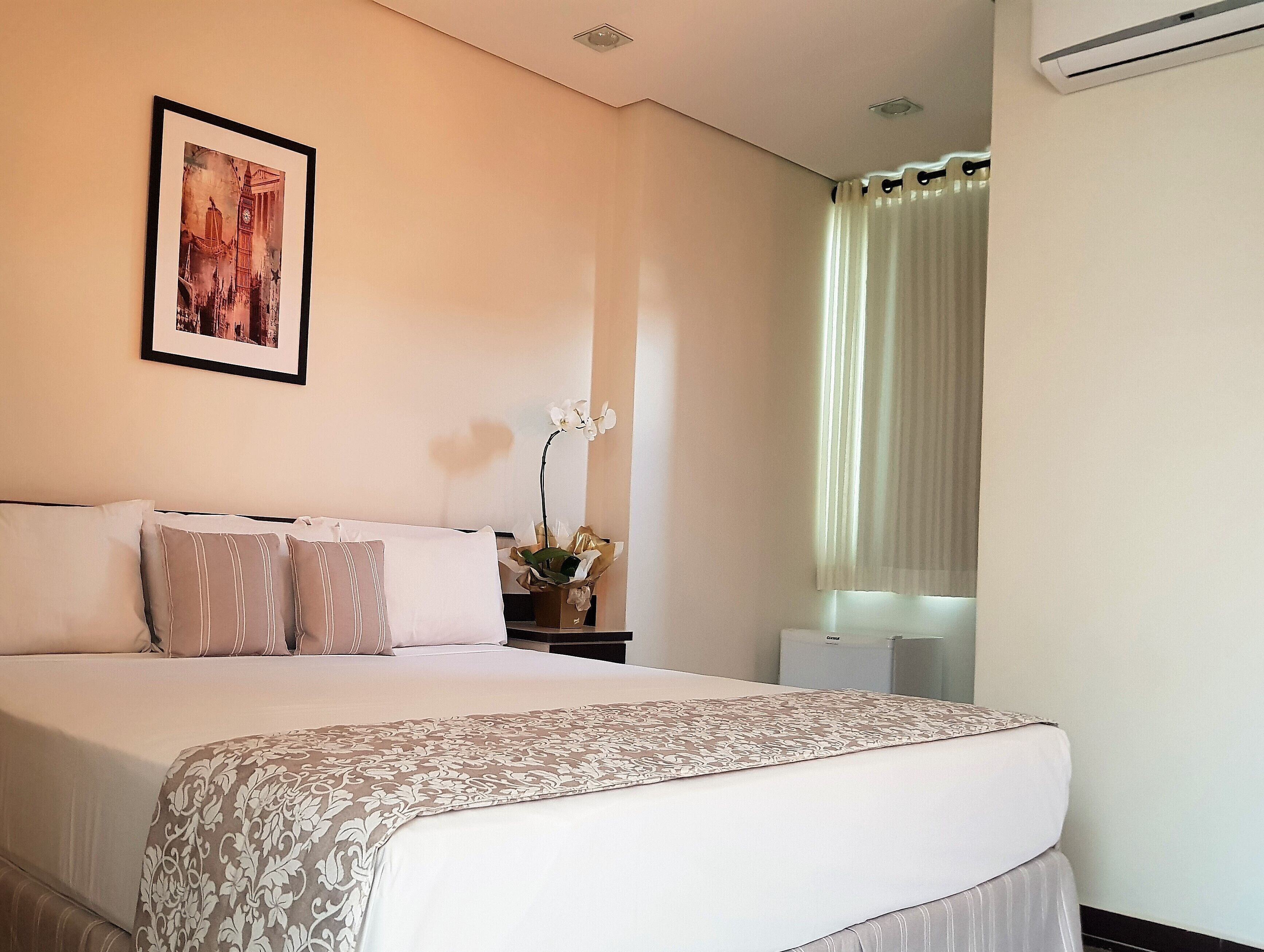 Minibar, desk, blackout drapes, iron/ironing board