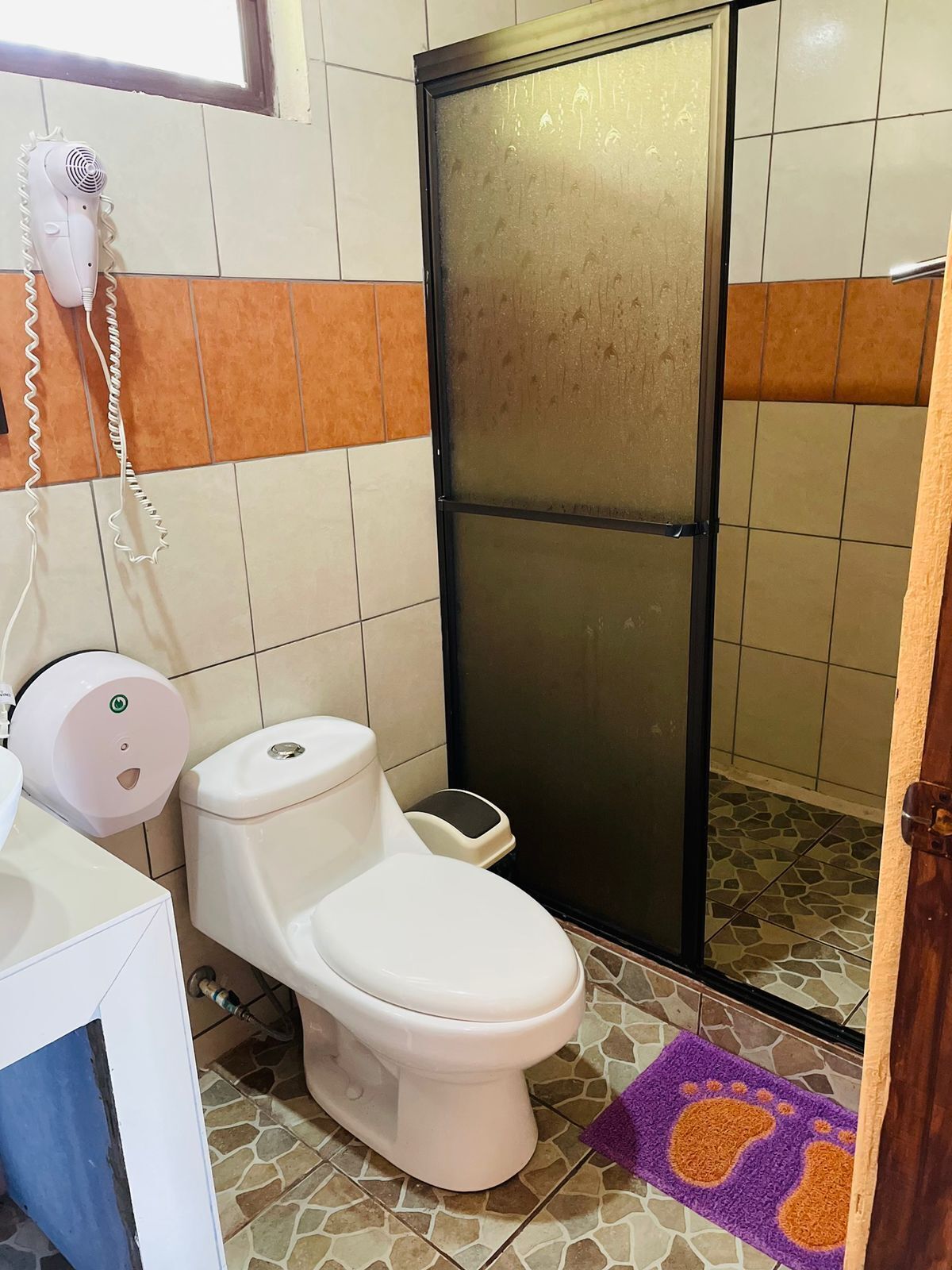 standard triple room | bathroom | shower, rainfall showerhead, hair dryer, towels