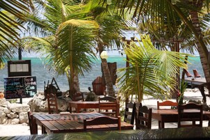 Cocktail bar, beach views, open select days