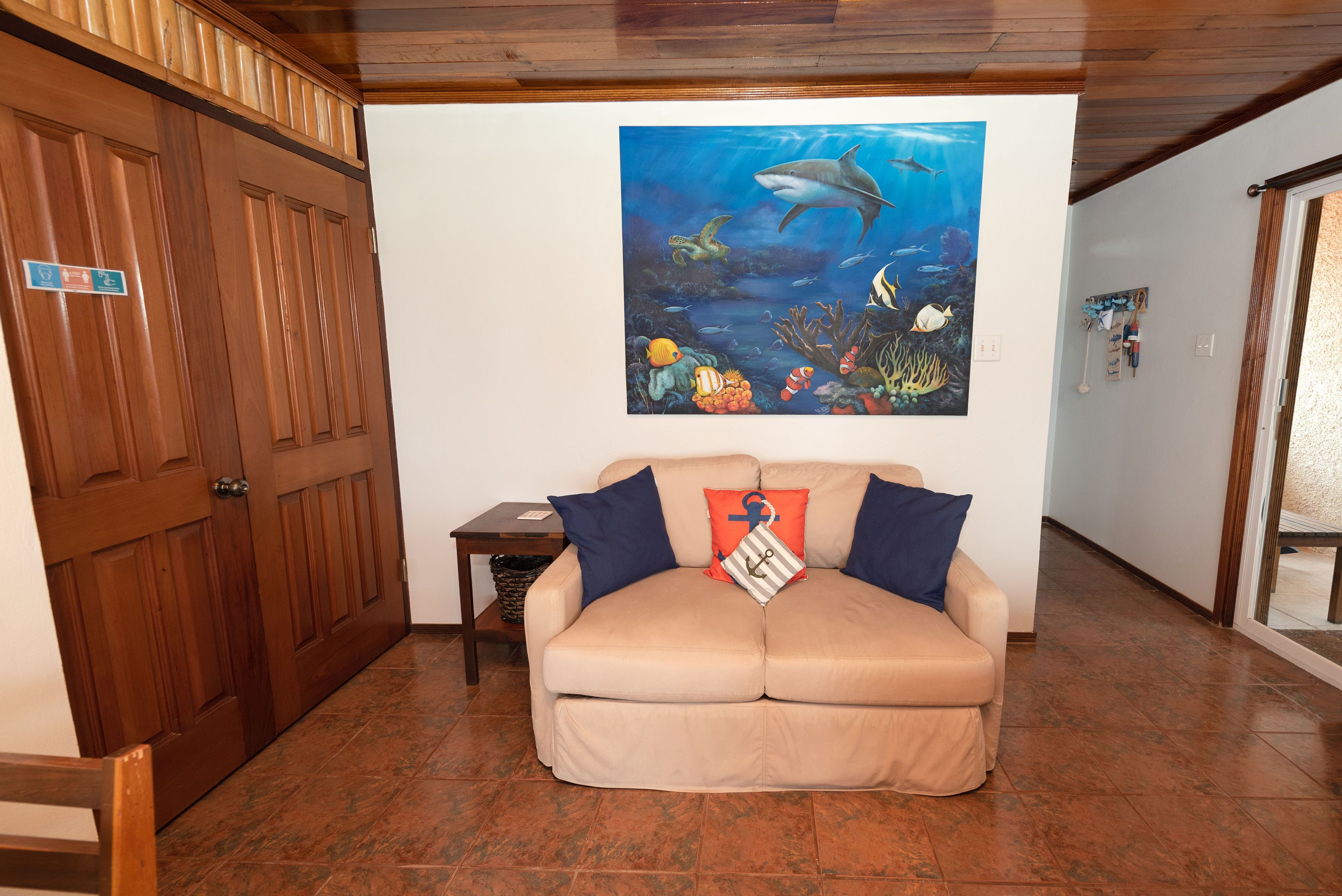reef shark: honeymoon studio, 1 bedroom, sea view, beachfront | living area | 32-inch smart tv with cable channels, tv, netflix