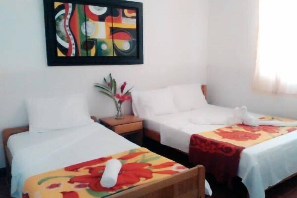 Basic Twin Room, Shared Bathroom | Select Comfort beds, rollaway beds, free WiFi