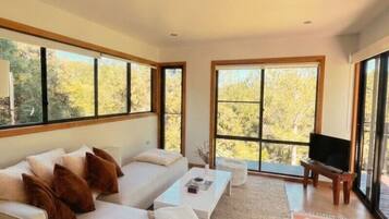 Sunrise | Living area | 30-inch flat-screen TV with cable channels, TV, DVD player