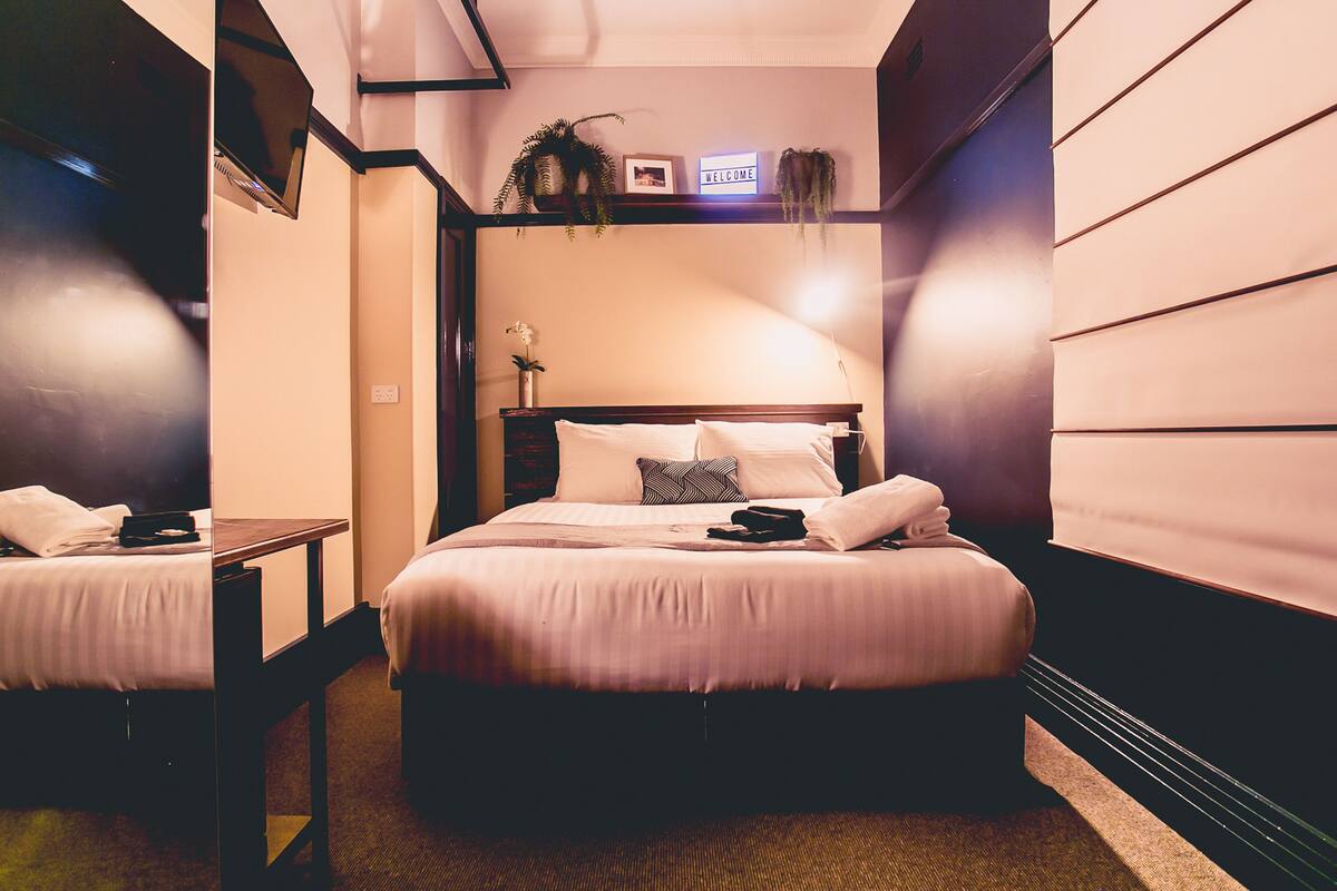 queen room with balcony and shared bathroom  | premium bedding, in-room safe, desk, soundproofing