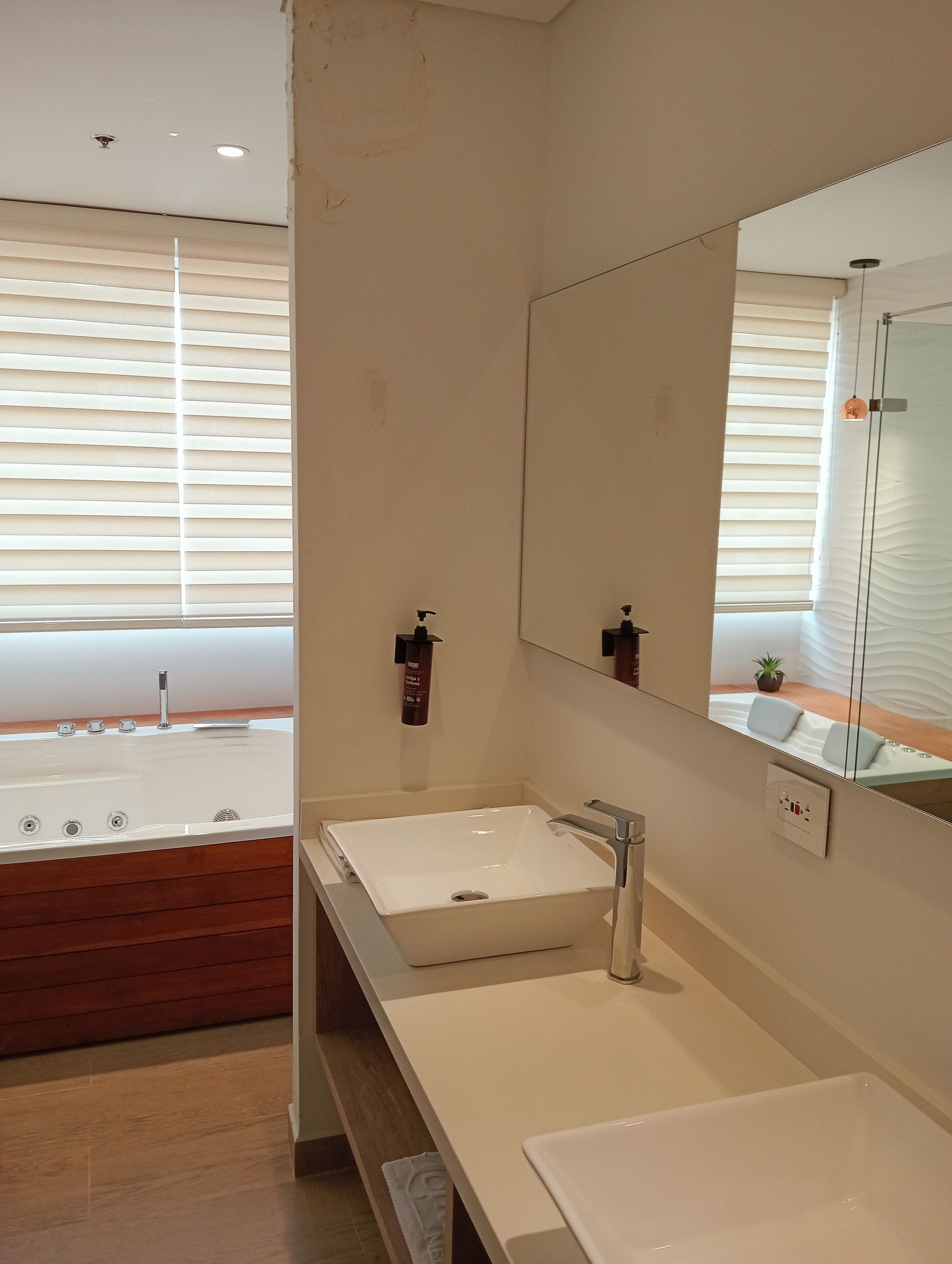 junior single room | bathroom | shower, rainfall showerhead, free toiletries, hair dryer