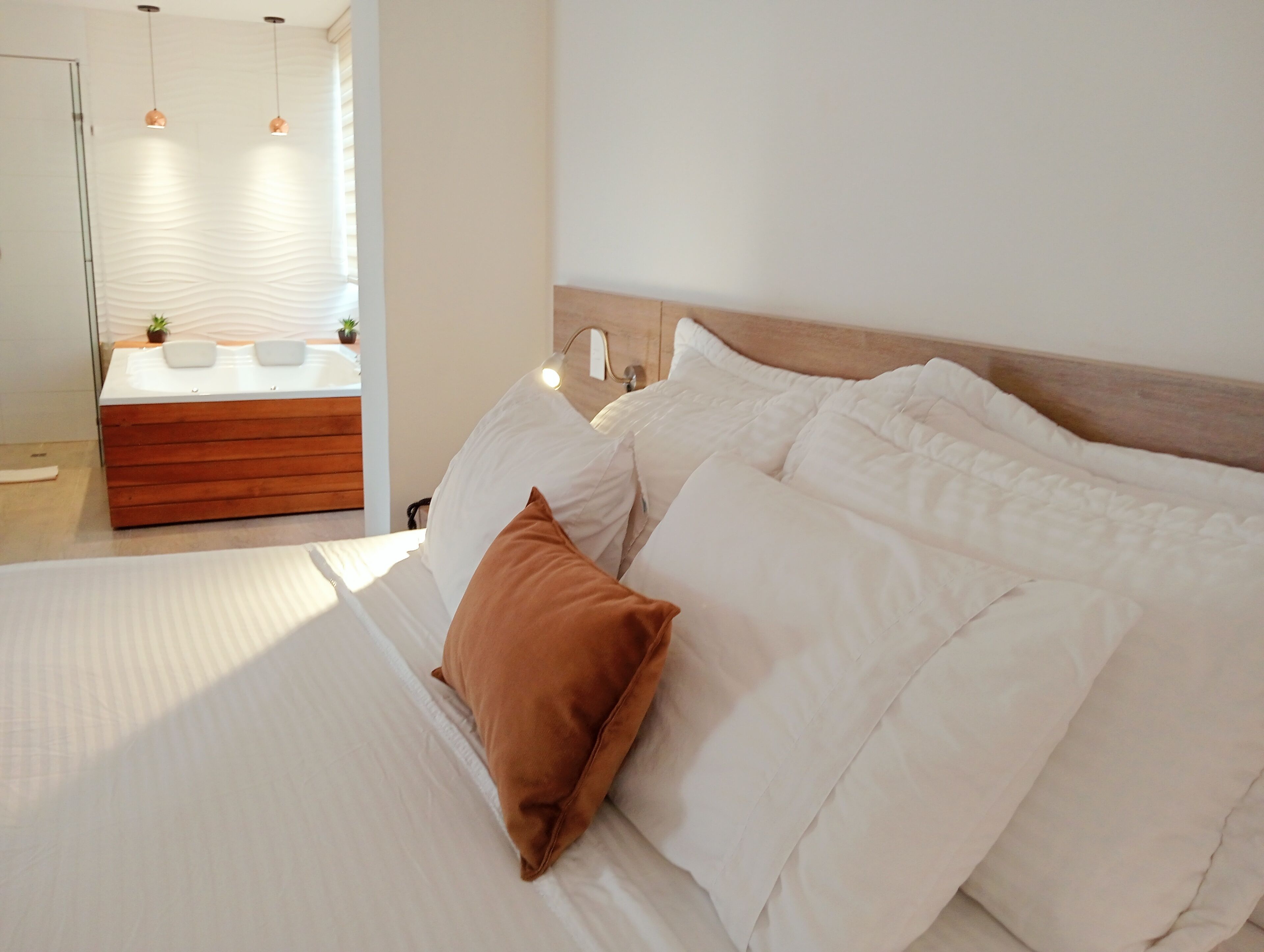 junior single room | premium bedding, down duvets, select comfort beds, minibar