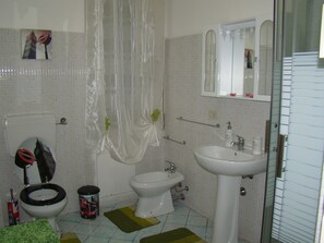 Shower, rainfall showerhead, towels