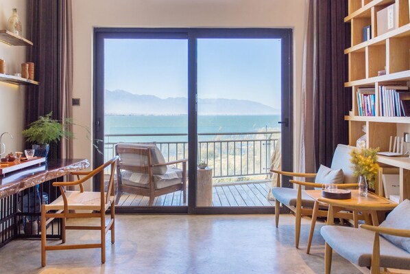 Loft, 1 Bedroom, Sea View | Living room | 50-inch LCD TV with satellite channels, TV