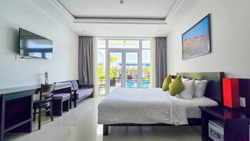 Deluxe Double Room, 1 King Bed, Balcony, Poolside | Premium bedding, pillow-top beds, minibar, in-room safe