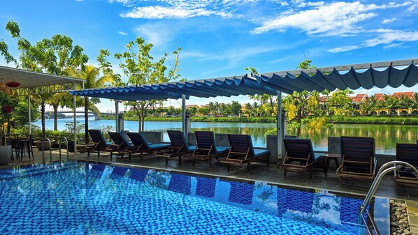 Outdoor pool, open 8:00 AM to 8:00 PM, pool umbrellas, sun loungers