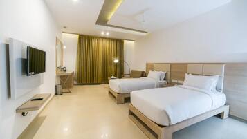 Ropa de cama de alta calidad, minibar y escritorio