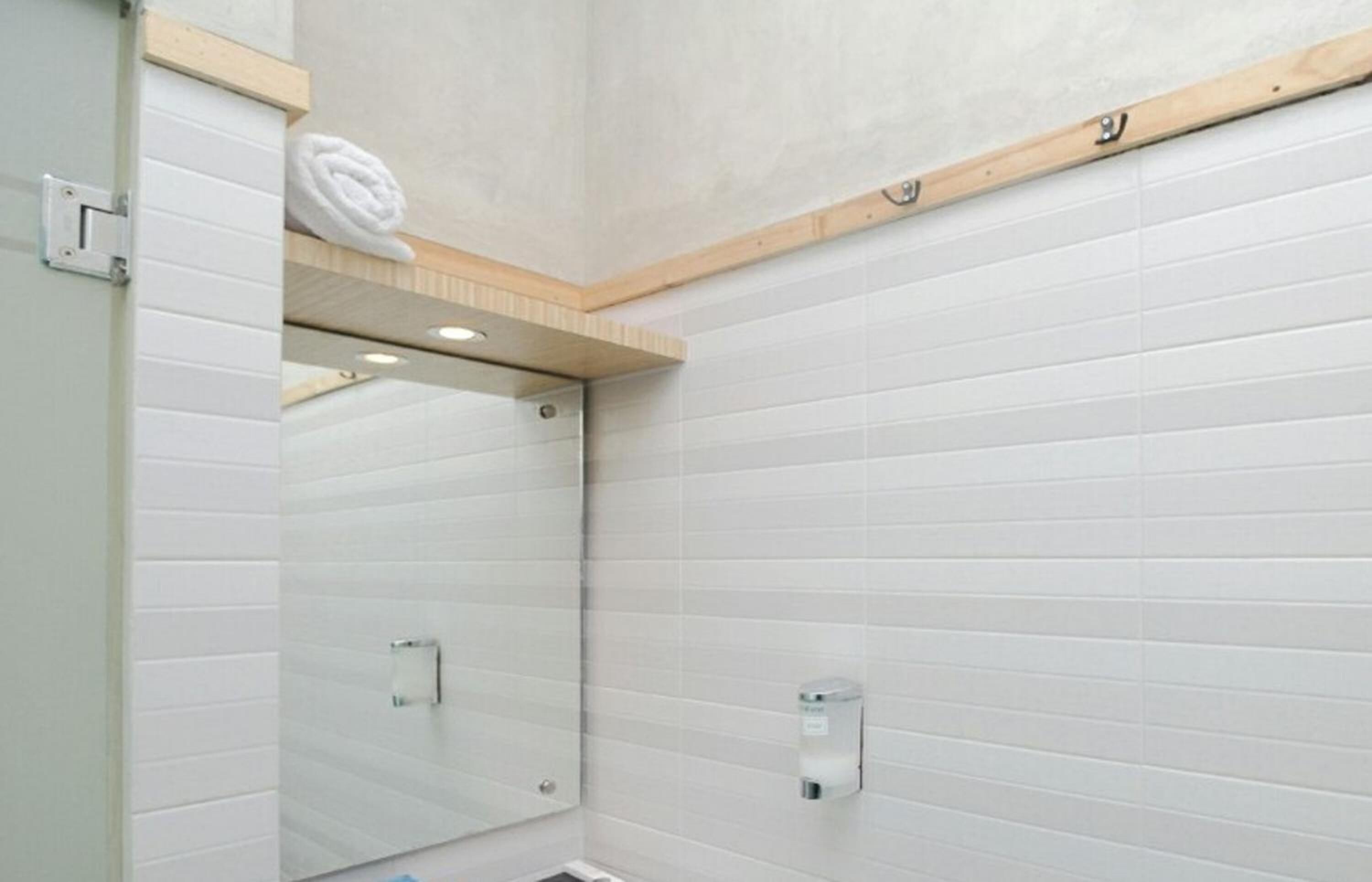 Shower, free toiletries, slippers, towels