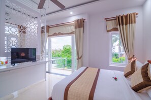 Deluxe-huone, 1 suuri parisänky | 1 makuuhuone, ylelliset vuodevaatteet, minibaari, tallelokero huoneessa