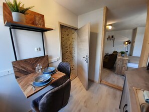 Deluxe Apartment | Private kitchen | Full-size fridge